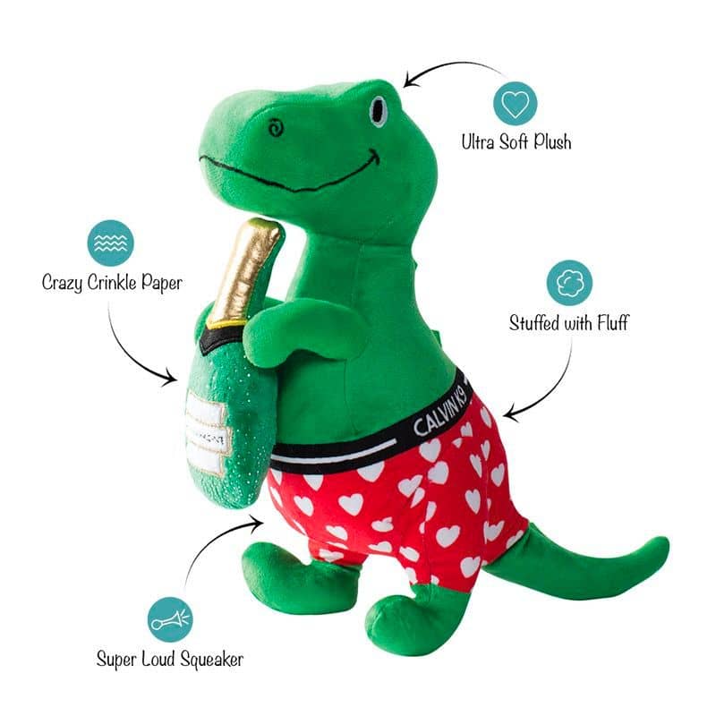 jouet peluche de Saint Valentin pour chien Bachelor Rex de la marque Fringe en forme de dinosaure TRex en boxer à coeur portant une bouteille de champagne