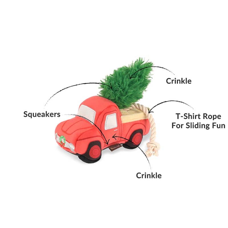 jouet peluche de Noël pour chien en forme de camion rouge transportant un sapin "Home for the holidays hauler" par la marque Play