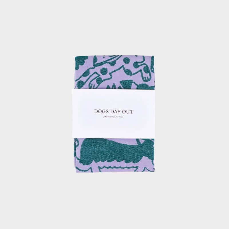 Torchon dogs day out de la marque Wrap en couleurs lila et vert en cadeau pour humain